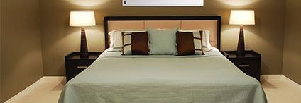 Schlafzimmer mit Heizung an der Wand